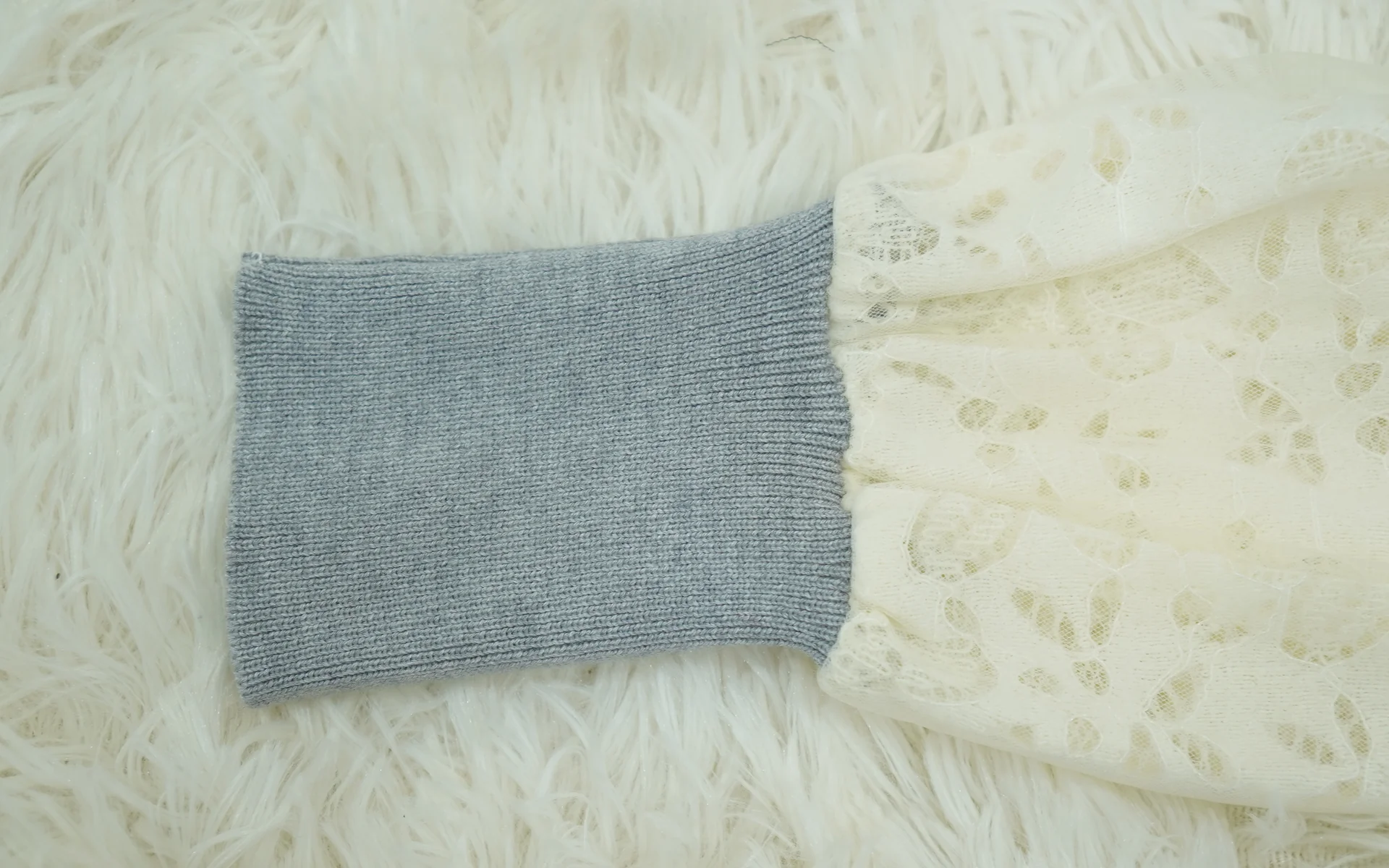 Contrasting knit structures - rib and pointelle lace - developed in one piece