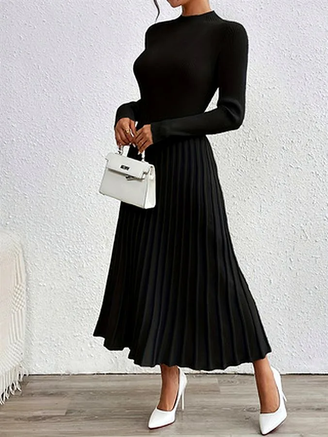 DK0192 reference: long-sleeve black knit dress with fitted bodice and pleated skirt